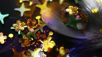 Close-up Of water drop with glitter on it in different colorful loghts in Karachi Pakistan 2022 photo