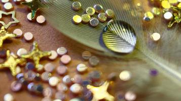 Close-up Of water drop with glitter on it in different colorful loghts in Karachi Pakistan 2022 photo