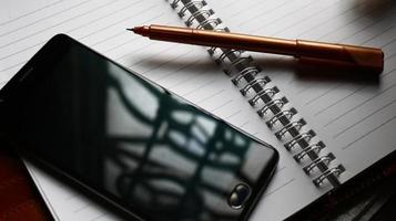 Work Bag And Office Diary On Table in Karachi Pakistan 2022 photo