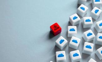 A hacker intrudes into a cloud computing system. The threat of obtaining unauthorized access to databases and personal data. Theft of financial information, security threat. photo