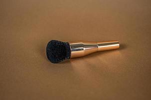 A brush for applying foundation for the face. Elite level cosmetics. A series of shots. Part-4 photo