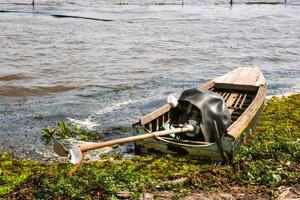 old wooden  boat fisherman  in lake south Thailand and travel photo