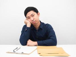 Man sit at workplace feeling bored with work white background photo