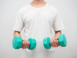 Man holding dumbbell green clolor white background crop shot photo