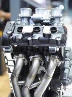 Closeup carburetor machine engine detail new and shiny of car transportation concept,The new engine detail technology photo