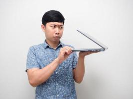 Man holding laptop gesture half open screen don't brave to looking photo