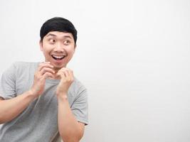 Asian man happy emotion looking at copy space white isolated photo