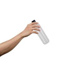 hombre mano sosteniendo botella de plástico blanco aislado foto