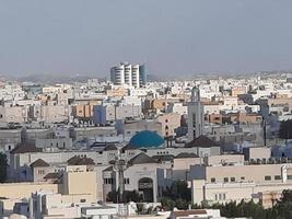 Beautiful daytime skyline of Jeddah city, the second largest city in Saudi Arabia. photo