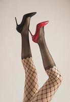 female legs with different type of high heels photo