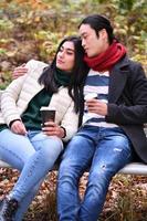 beautiful happy couple enjoying the day together in the park. photo