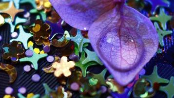 Close-up Of water drop with glitter on it in different colorful loghts in Karachi Pakistan 2022 photo