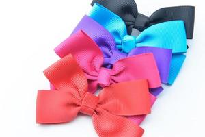 Striped bow tie multi color on white background photo