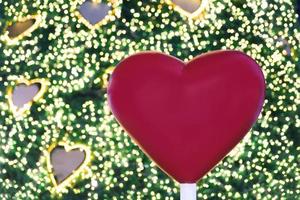 Red heart and Christmas blur bokeh background photo