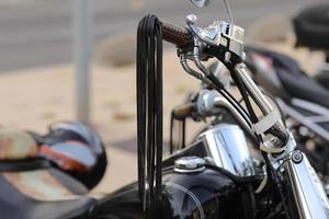 retro motorcycles parked on the motorcycles parking lot. Meetingof bikers before a join trip through the city street photo