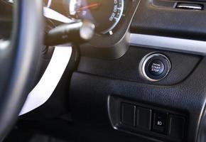 Button of automatic start and stop the engine car photo