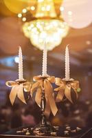 candlesticks with candles in ballroom photo