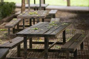 old wooden table in public photo