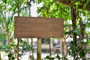 empty wooden sign on wood fence photo