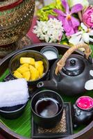 A set of dessert, Sticky rice with mango and tea photo