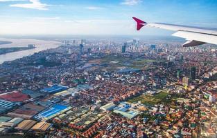 The cityscape view of Phnom Penh City from the window of airplane photo