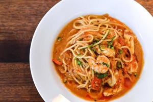 The Italian spaghetti with red sauce and prawn photo