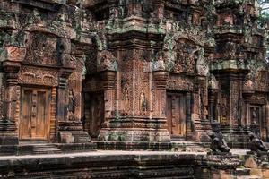 Banteay Srei is built largely of red sandstone and is a 10th-century Cambodian temple dedicated to the Hindu god Shiva, Siem Reap, Cambodia photo