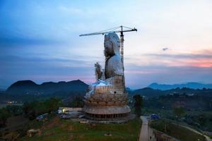 Chinese goddess under construction - wat hyua pla kang , Chiang Rai, Thailand photo