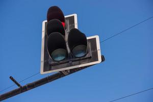 Red light traffic against the blue sky photo