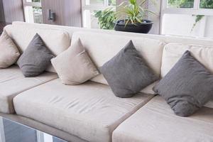 Sofa and pillows in living room photo