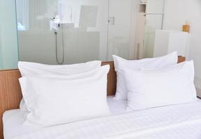 bed and pillows in modern bedroom photo