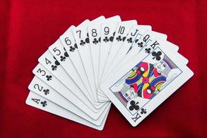poker cards on red background photo