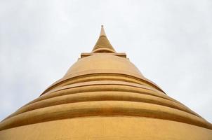 The golden pagoda under the sky photo