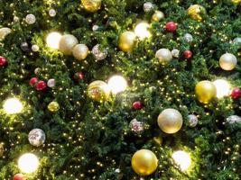 Christmas tree with light bulbs background photo