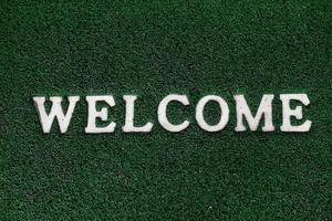 Welcome door mat for greeting photo