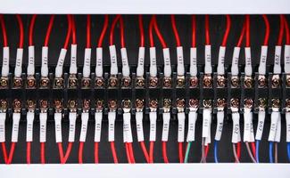 Close up circuit breakers and wire in control panel photo