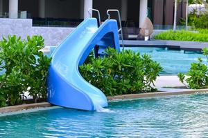 water slider at swimming pool photo