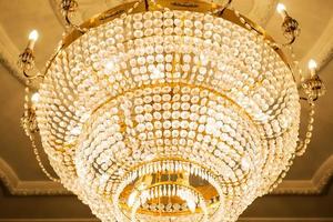 beautiful crystal chandelier in ball room photo