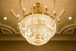 beautiful crystal chandelier in ball room photo