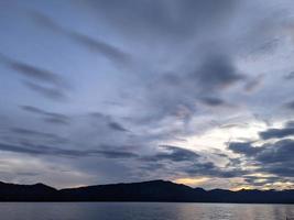 the beauty of the morning sky in lake toba photo