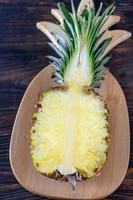 Pineapple on the wooden board photo