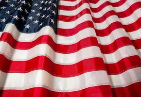 bandera americana de los estados unidos. día de la independencia el 4 de julio, día conmemorativo, día de los veteranos, día del trabajo. difuminar foto