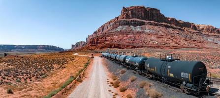 Aerial view of the cargo locomotive railroad engine crossing Arizona desert photo