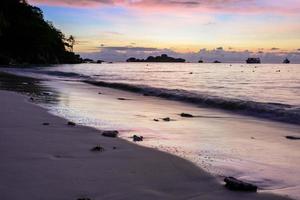 Beautiful sunrise at the beach photo