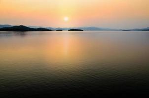 Beautiful lake at sunset photo