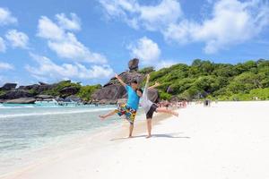 Happy couple on beach at Similan in Thailand photo