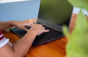 Human hand working on computer. business concept and communication technology photo