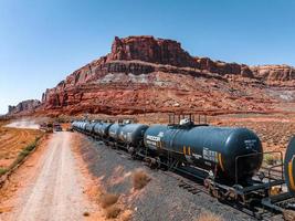 Aerial view of the cargo locomotive railroad engine crossing Arizona desert photo