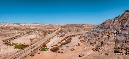 Panoramic image of a lonely, seemingly endless road in the desert of Southern Arizona. photo