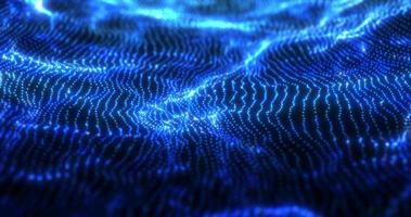 Abstract blue futuristic waves from a grid of particles lines glowing bright shiny neon digital magical energy on a dark background. Abstract background photo